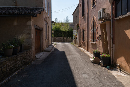 Narrow stone alley in a peaceful traditional village in the South West of France