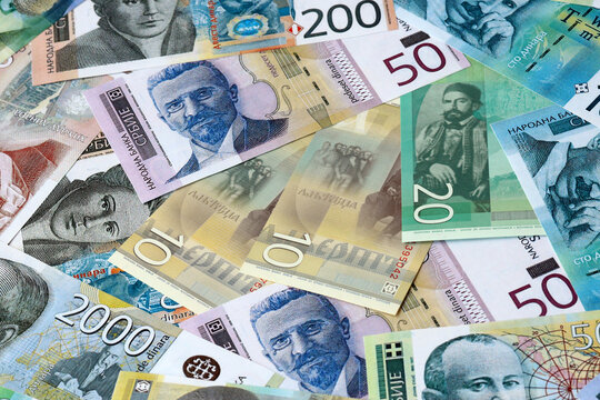 Serbian dinar money bills in pile on table. Serbia RSD currency cash close up