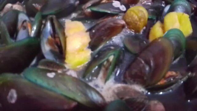 The process of cooking shellfish