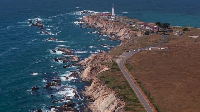 Eagle-eyed views capture Point Arena Lighthouse situated on cliffs by the Pacific Ocean south of Mendocino in northern California