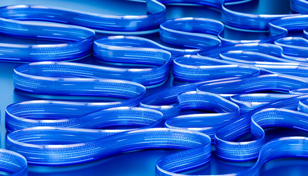 3D binary ribbon pattern with glossy blue loops and depth.