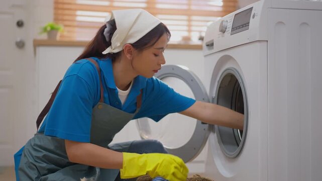 Cleaner woman washing machine glove laundry apron uniform home cleaning appliance, yellow glove door care, cloth loading, housework service in bright laundry room