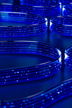 3D glowing data rings with layered blue points and depth
