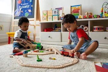 Children playing with wooden toys © Rawpixel.com