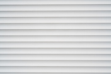 Fototapeta premium White metal roller shutter texture with horizontal lines