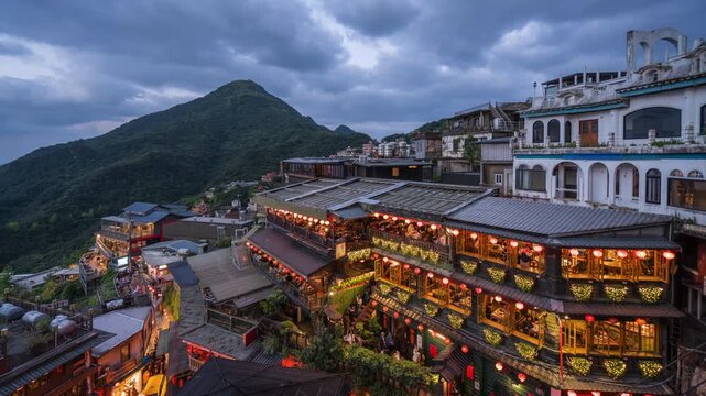 Jiufen dusk to night timelapse showing tourists visiting the famous Old Street shops and teahouses, New Taipei City, Taiwan.