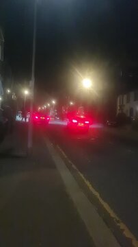 Low Angle Illuminated Streets View of Luton City of England United Kingdom After Sunset Night. Wide Angle Camera Footage Was Captured During Walk at Night of June 27th, 2026. 