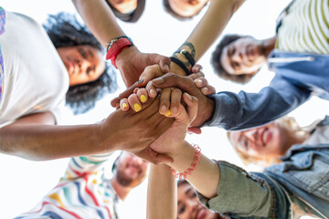 Obraz premium Diverse hands united in teamwork.