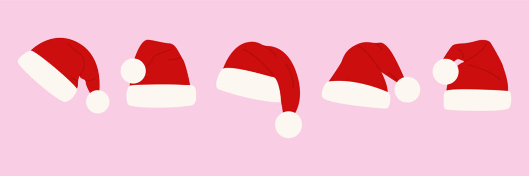 Seamless red santa claus hats border with white fur and pom poms in a row on pink background for Christmas holiday apparel decor