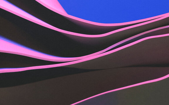 Wavy shapes illuminated by pink light, studio shot photo