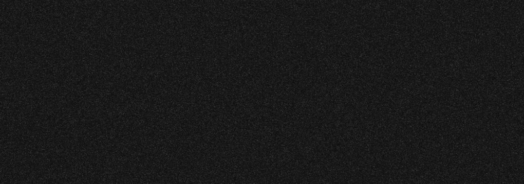 Uniform dark grey texture with fine grain pattern across the entire surface