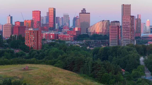 Telephoto Aerial Sunrise Video of Peachstone Henge and Manchester Skyline Featuring Victoria North