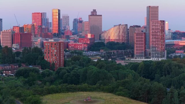 Telephoto Aerial Sunrise Video of Peachstone Henge and Manchester Skyline Featuring Victoria North