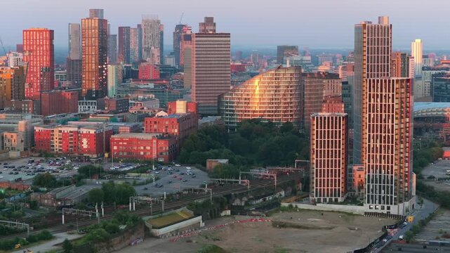 Aerial Video of Victoria Riverside and Manchester Skyline at Sunrise. 