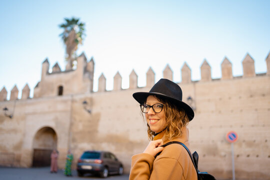 A woman traveller is visiting a fortress