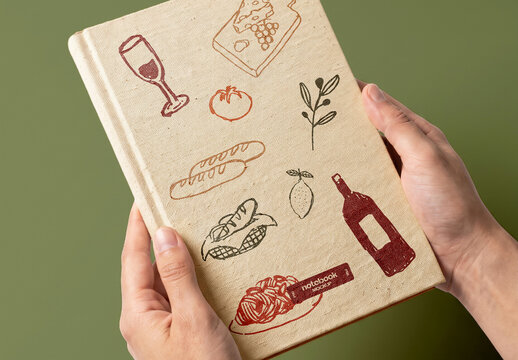 Notebook Held in Hands Mockup