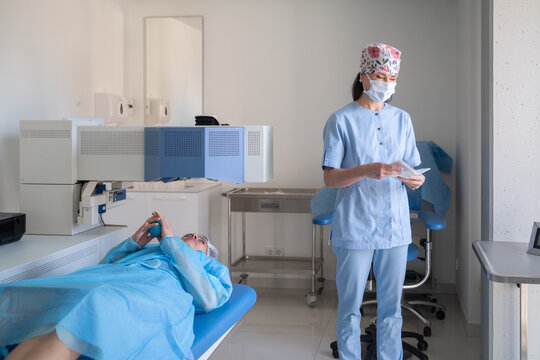 Doctor Prepares for Medical Procedure in Clinic Room