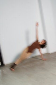 Ballet Dancer Practicing in a Studio During a Dance Session