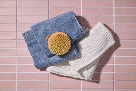 Spa day essentials: soft towels and natural bristle body brush