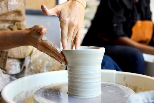 Clay Shaping in Artisan Workshop