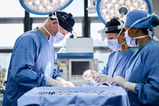 Surgeons Perform Surgery in Operating Room