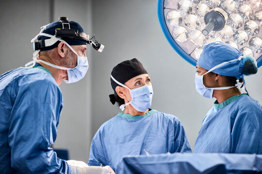 Surgeons Perform Surgery