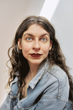 Young woman in a studio with soft lighting