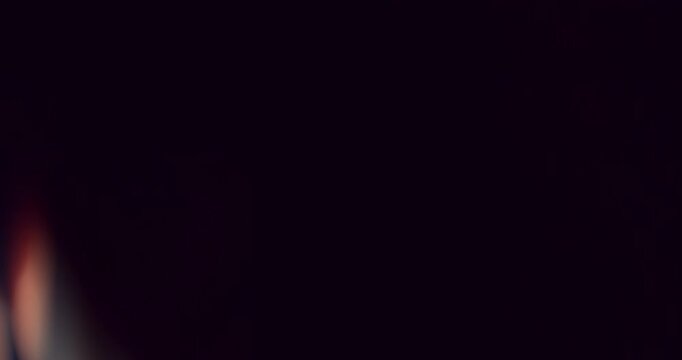 Slow motion cinematic lens flare and light leak effect isolated on black background. Perfect overlay for VFX, transitions, title reveals, film burn style and glow highlights.