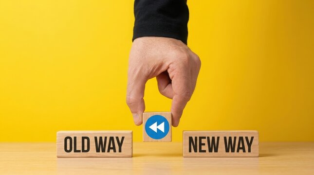 Hand placing rewind symbol block between old way and new way blocks, concept of choice