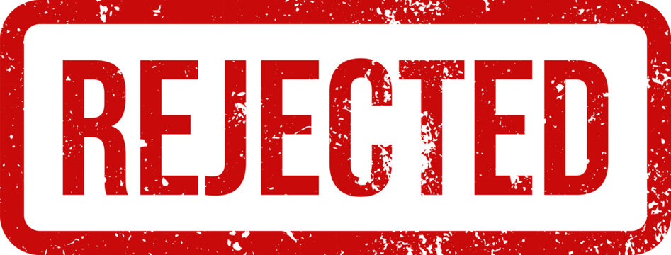 A red grunge rubber stamp with the word rejected isolated on a white background for business documents