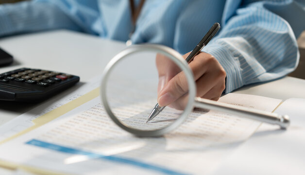 Examining documents with a magnifying glass, highlighting tax records, real estate paperwork, investment research, application forms, document verification, and due diligence.