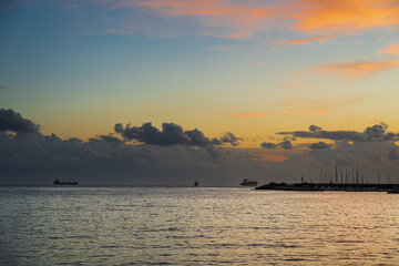 Fototapeta premium autumnal sunset on the city coast, Salerno, Italy