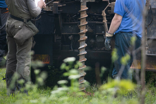 engineering geological surveys, environmental soil analysis, a drill drills into the soil	