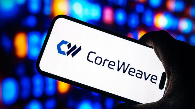 Coreweave cloud computing logo on smartphone screen with colorful blurred bokeh background representing ai infrastructure.