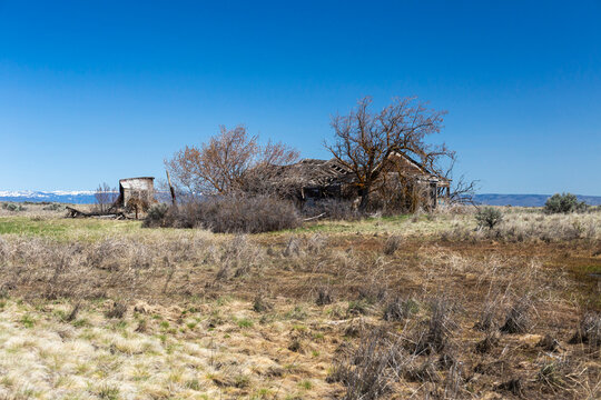 Derelict house on dirt road in central Washington