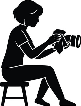 Woman Cleaning Camera Lens Vector Silhouette