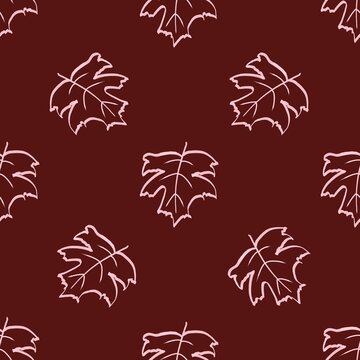 Maple leaves seamless repeating pattern against a deep burgundy background to create a seasonal design.