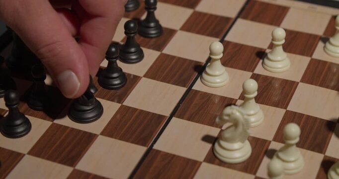 close up of chess pieces during a game