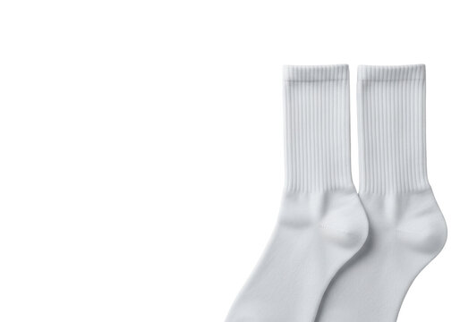 Two transparent cotton crew socks neatly aligned in a flat lay on a minimalist light surface. Concept of a fresh start and meticulous preparation