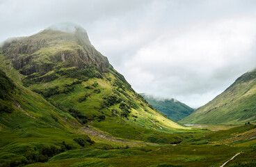 Scenic Scottish Highlands and Isle of Skye Landscapes with Mountains, Valleys and Green Nature © Patricia