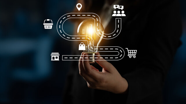 A dynamic business concept featuring a light bulb held by a hand, symbolizing innovative ideas and pathways, complemented by map icons that represent growth and opportunity in a modern setting. Ledger