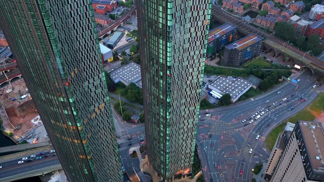 Close Up Aerial Video of Trinity Island Towers in Manchester UK and Mancunian Way Traffic down below. 