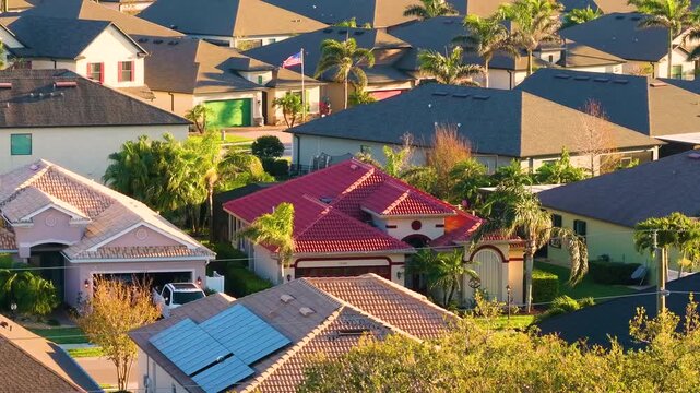 American gated community houses in rural US suburbs. View from above of large residential homes in small town in southwest Florida