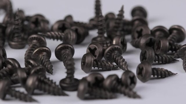Metal screws for fastening equipment. Soft focus. Close-up. 