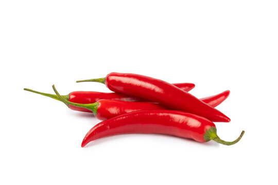Red chili pepper isolated on white background. Fresh slice of hot pepper. Vegan, vegetable. Pepper cut into slices on a white background close-up.