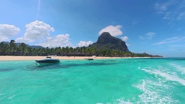 Beautiful tropical beach with turquoise water and Le Morne Brabant mountain in Mauritius