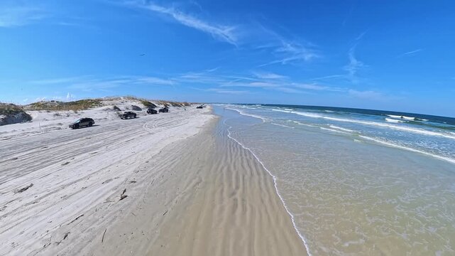 Smooth Tracking Along Huguenot Memorial Park Beach Near Jacksonville Florida With Parked Vehicles 4K
