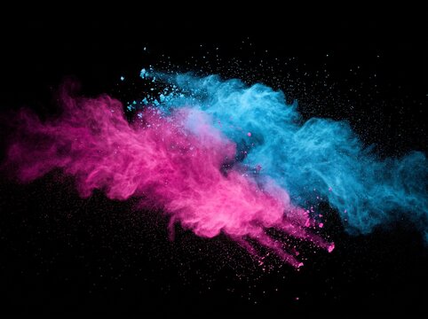 Bright colorful smoke clouds with pink and blue paint powder explosion on a black background