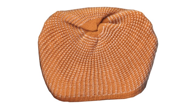 Orange knitted winter beanie hat top view isolated on white background