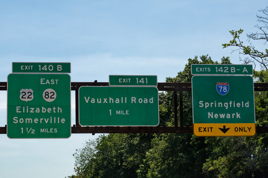 signs on the Garden State Parkway in New Jersey for Exit 142 B-A to I-78 Springfield and Newark, Exit 141 to Vauxhall Road, and Exit 140 B to US-22 and East NJ-82 Elizabeth and Somerville
